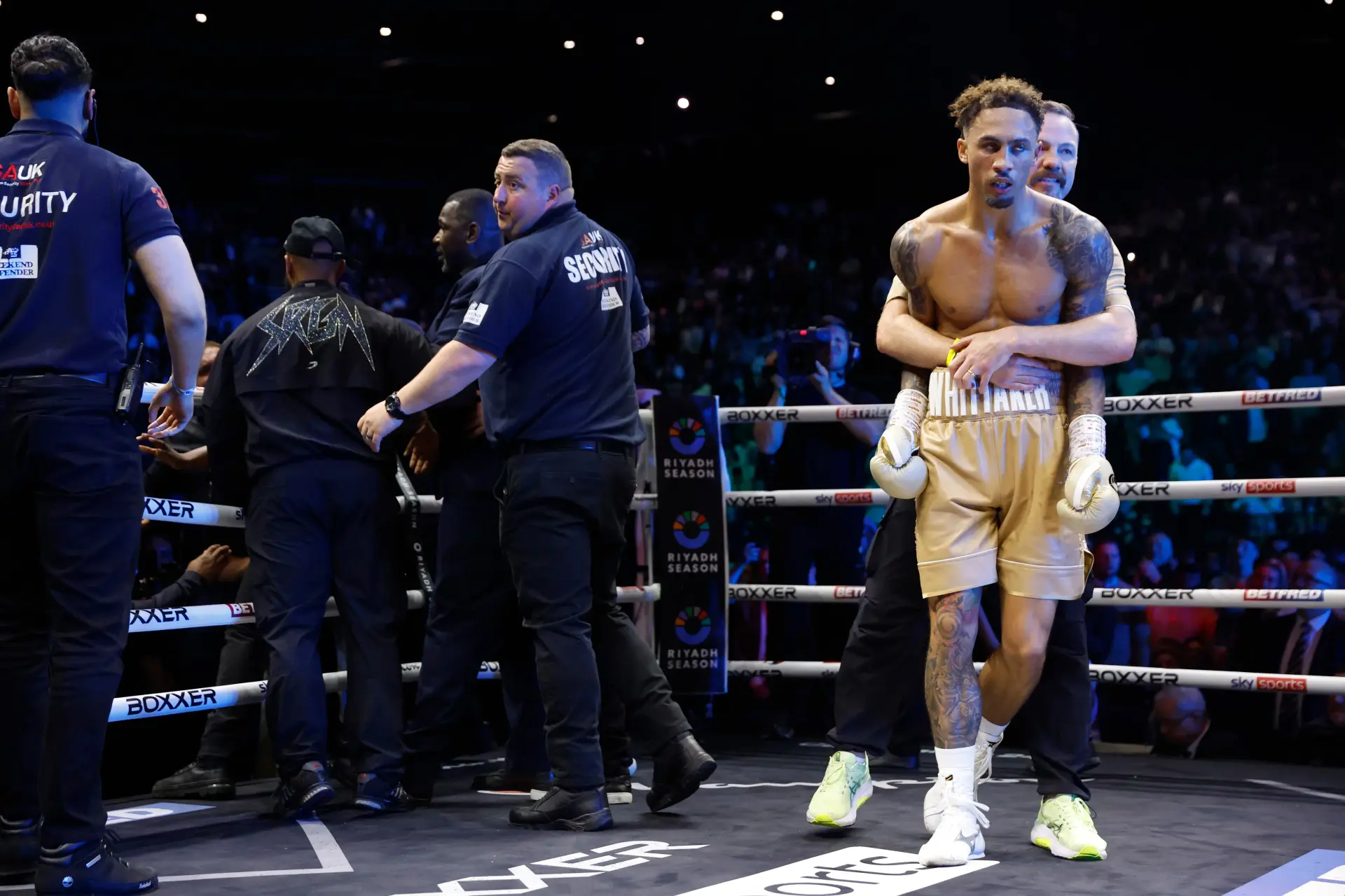 Andy Lee holds Ben Whittaker 4.20.2025