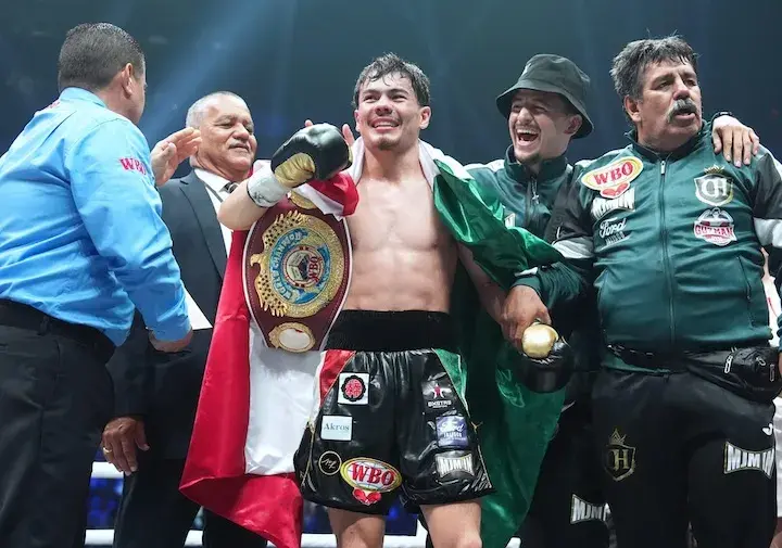 Christian Medina celebrates after winning the WBO bantamweight title with a fourth-round TKO of Yoshiki Takei on September 14, 2025.