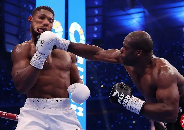 Daniel Dubois' right hand distorts the features of Anthony Joshua at Wembley Stadium
