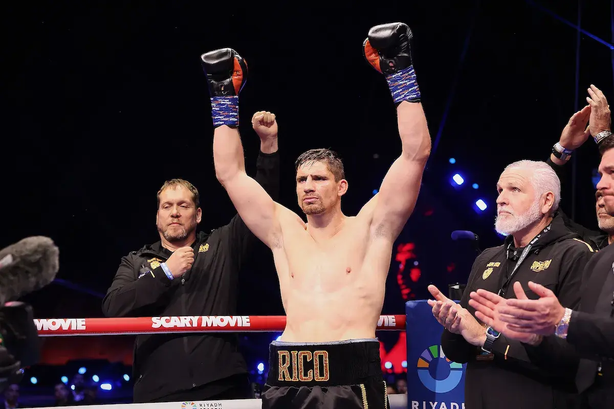 Rico Verhoeven, with coach Peter Fury, is announced to the crowd ahead of his fight with Oleksandr Usyk