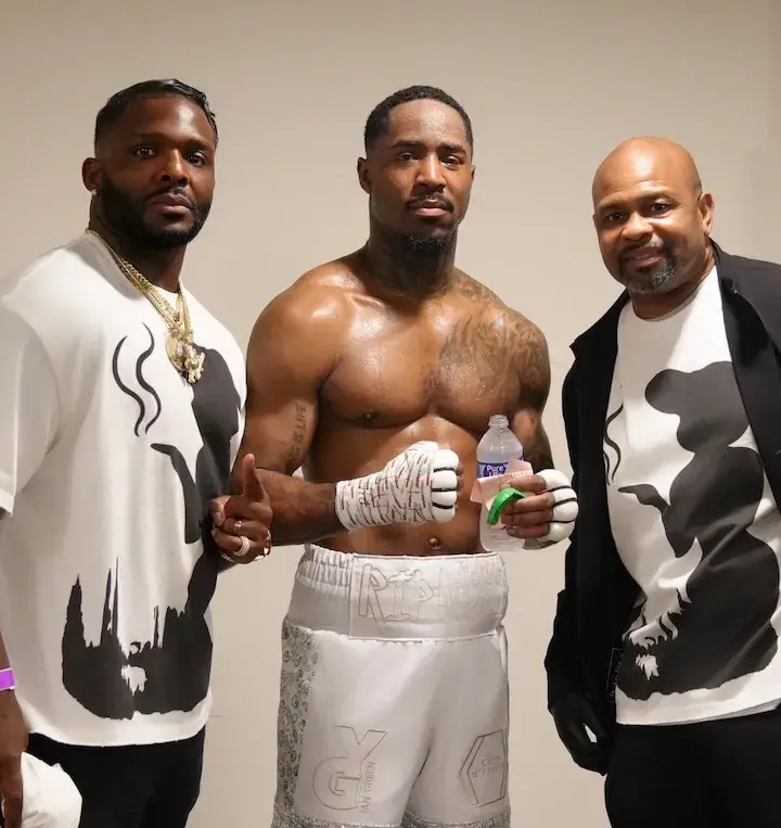 Ian Green (middle) with his new trainer Roy Jones Jnr (right). (March 13, 2026)