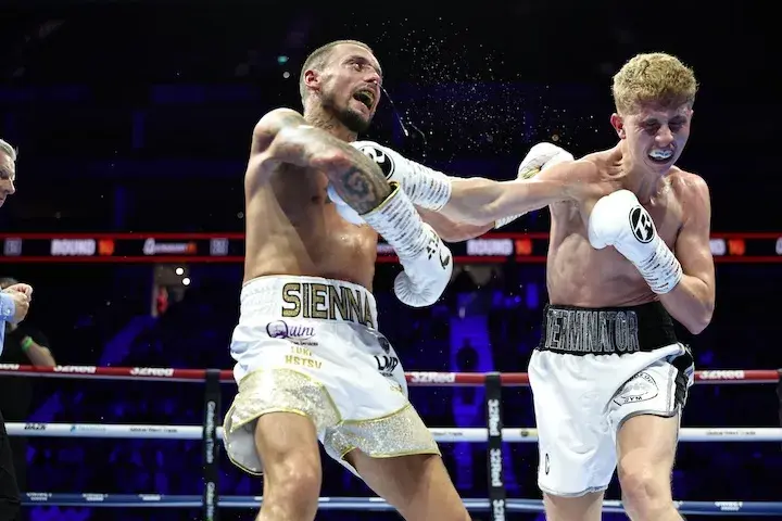 Mitchell Smith [left] wins a 10-round decision over Arnie Dawson that will later be changed to a no-contest