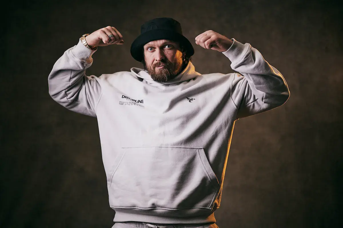 Oleksandr Usyk plays for the camera in April 2026