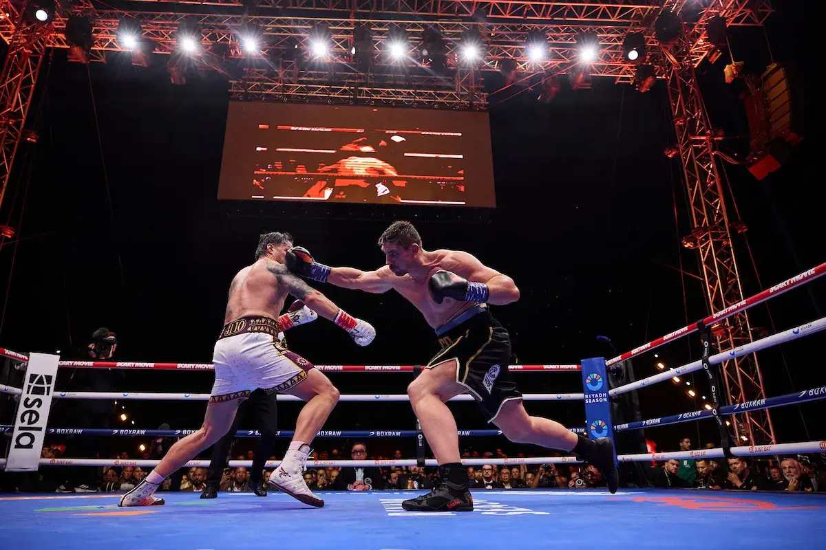 Rico Verhoeven [right] clouts Oleksandr Usyk in Egypt on May 23, 2026
