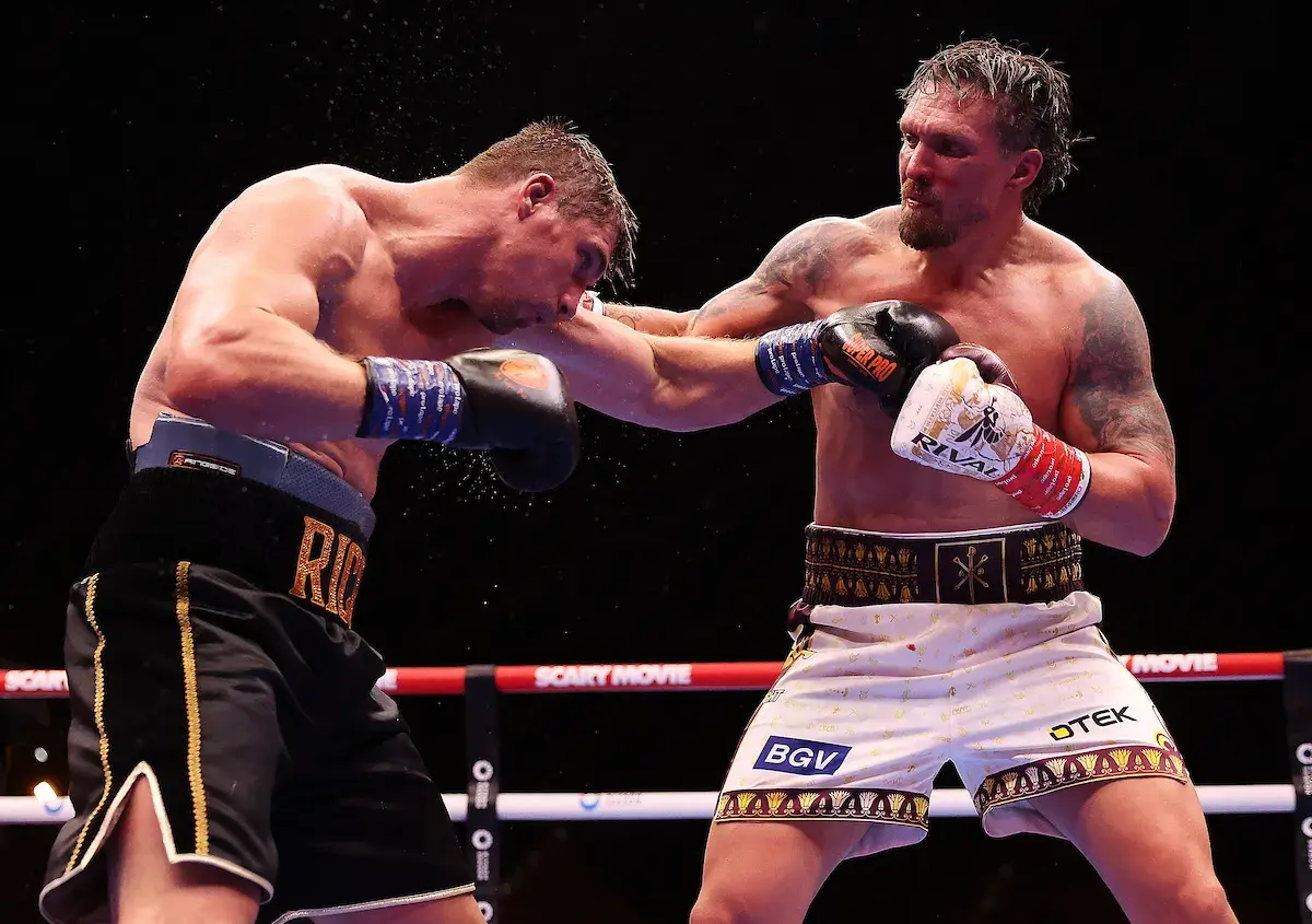 Oleksandr Usyk, attacking from the right of picture, turns up the heat on Rico Verhoeven