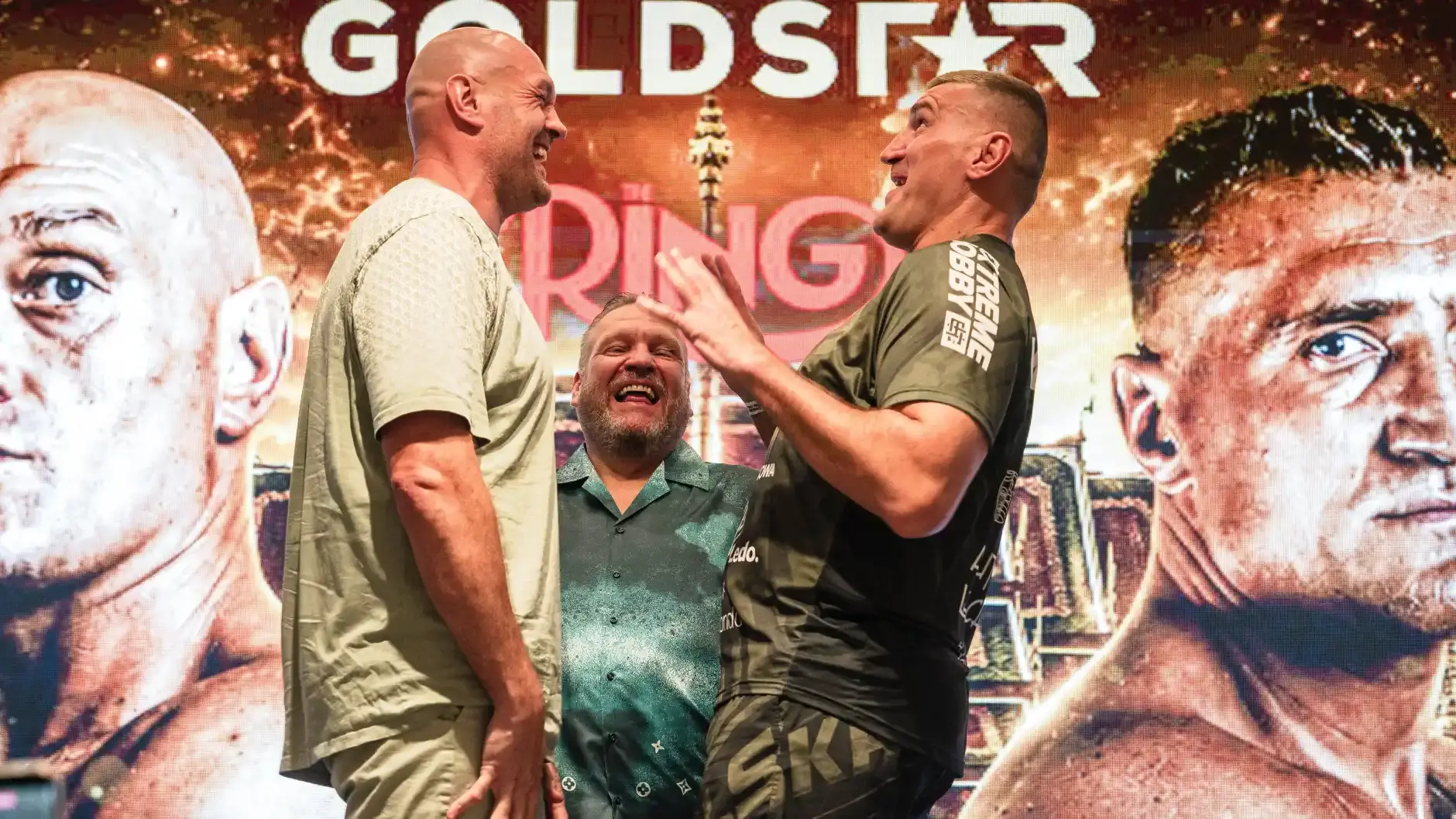 Tyson Fury and Mariusz Wach share a joke in the days leading up to their July 24 fight in Thailand