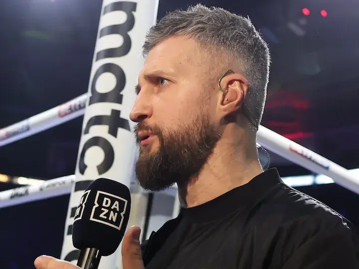 Carl Froch, former super middleweight champion and IBHOF inductee, speaks at ringside.