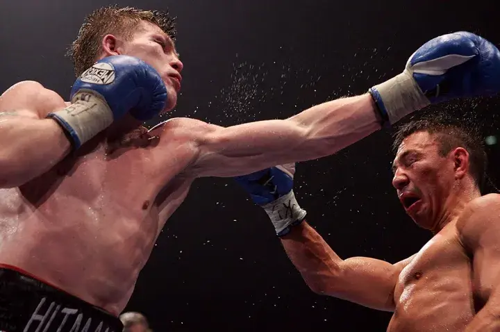 Ricky Hatton throws a punch at Kostya Tszyu en route to upsetting him for the lineal junior welterweight championship.