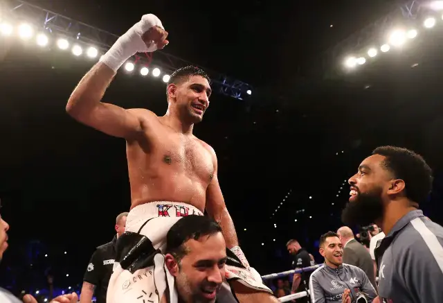 Amir Khan celebrates his 2018 victory over Samuel Vargas
