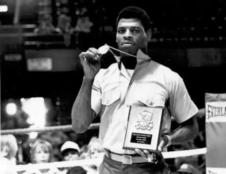 Leon Spinks, one of the biggest underdogs in heavyweight history, shows off his Olympic gold medal