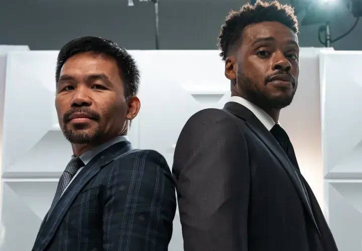 Manny Pacquiao (left) pictured with fellow welterweight titleholder Errol Spence