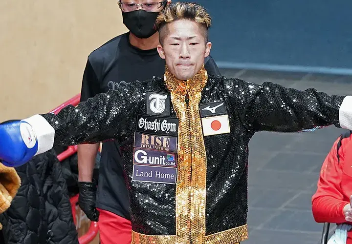 Takuma Inoue prepares to ditch the robe and do battle