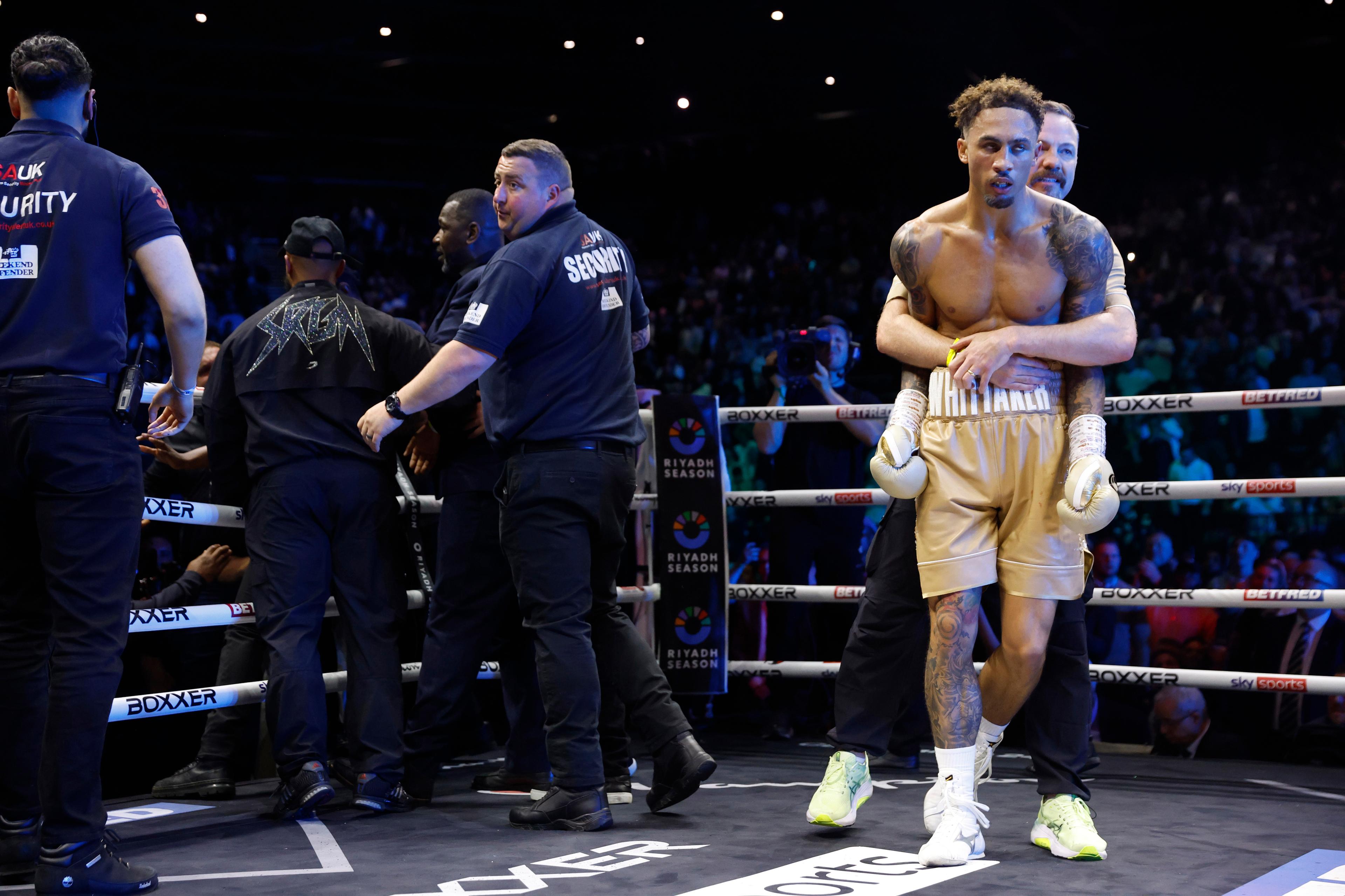 Andy Lee holds Ben Whittaker 4.20.2025