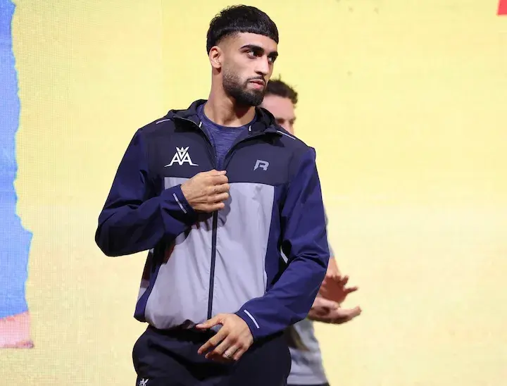 Adam Azim prepares to weigh in against Kurt Scoby