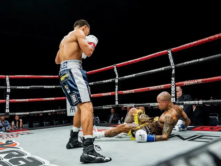 Albert Gonzalez (left) stands over Brandon Chambers after dropping him with a punch. (March 21, 2026)