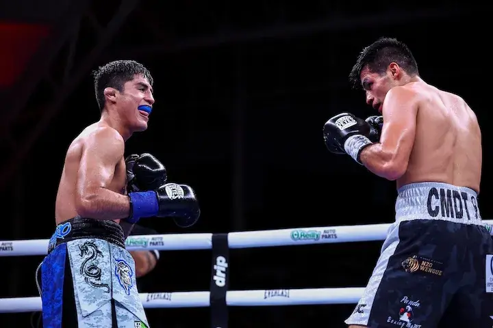 Jose Amaro (left) and Alberto Mora (right) during their fight on February 6, 2026