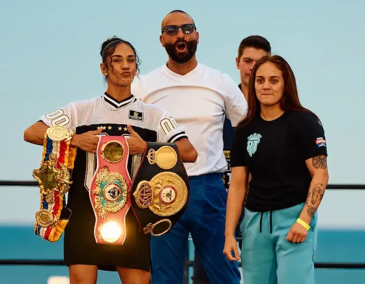 Amanda Serrano poses with her world championships onstage with opponent Reina Tellez and promoter Nakisa Bidarian of Most Valuable Promotions ahead of their fight in January 2026.