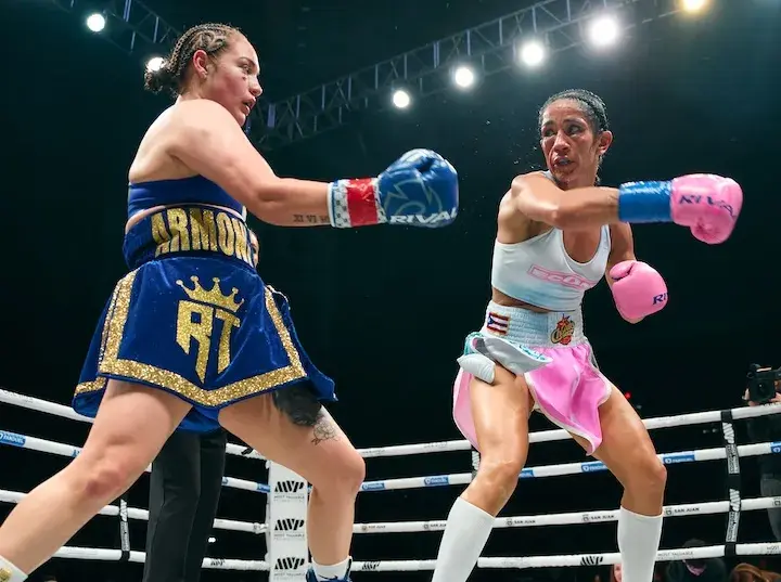 Amanda Serrano and Reina Tellez trade shots in their boxing match on January 3, 2026.