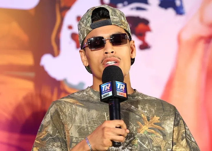 Angelo Leo speaks at a press conference.
