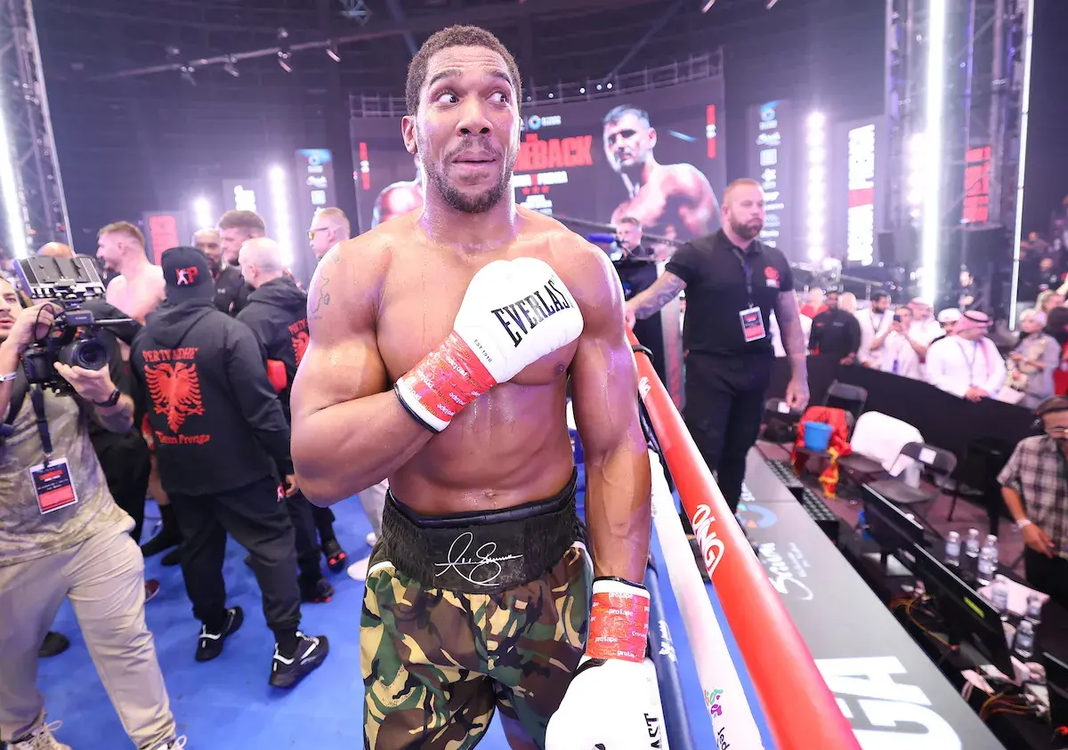 A relieved Anthony Joshua celebrates victory over Kristian Prenga in Saudi Arabia