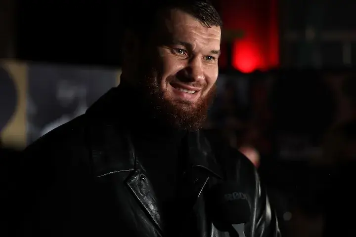 Arslanbek Makhmudov greets the UK media in September 2025