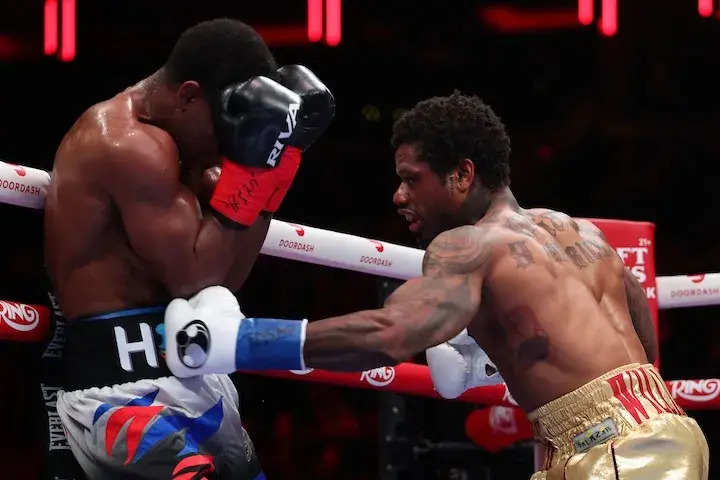 Austin Williams (left) lands a punch on Wendy Toussaint. Photo taken on January 31, 2026.
