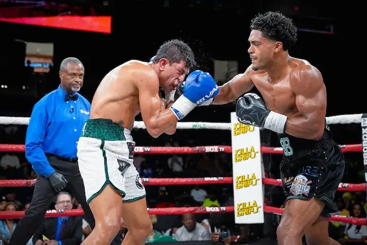 Benjamin Johnson lands a right hand on Luis Ramos during their boxing match on September 5, 2025.