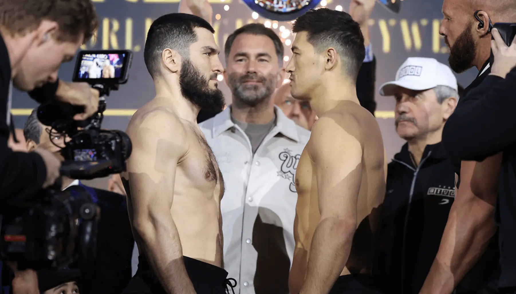Artur Beterbiev [left] eyeballs Dmitry Bivol ahead of their 2025 rematch