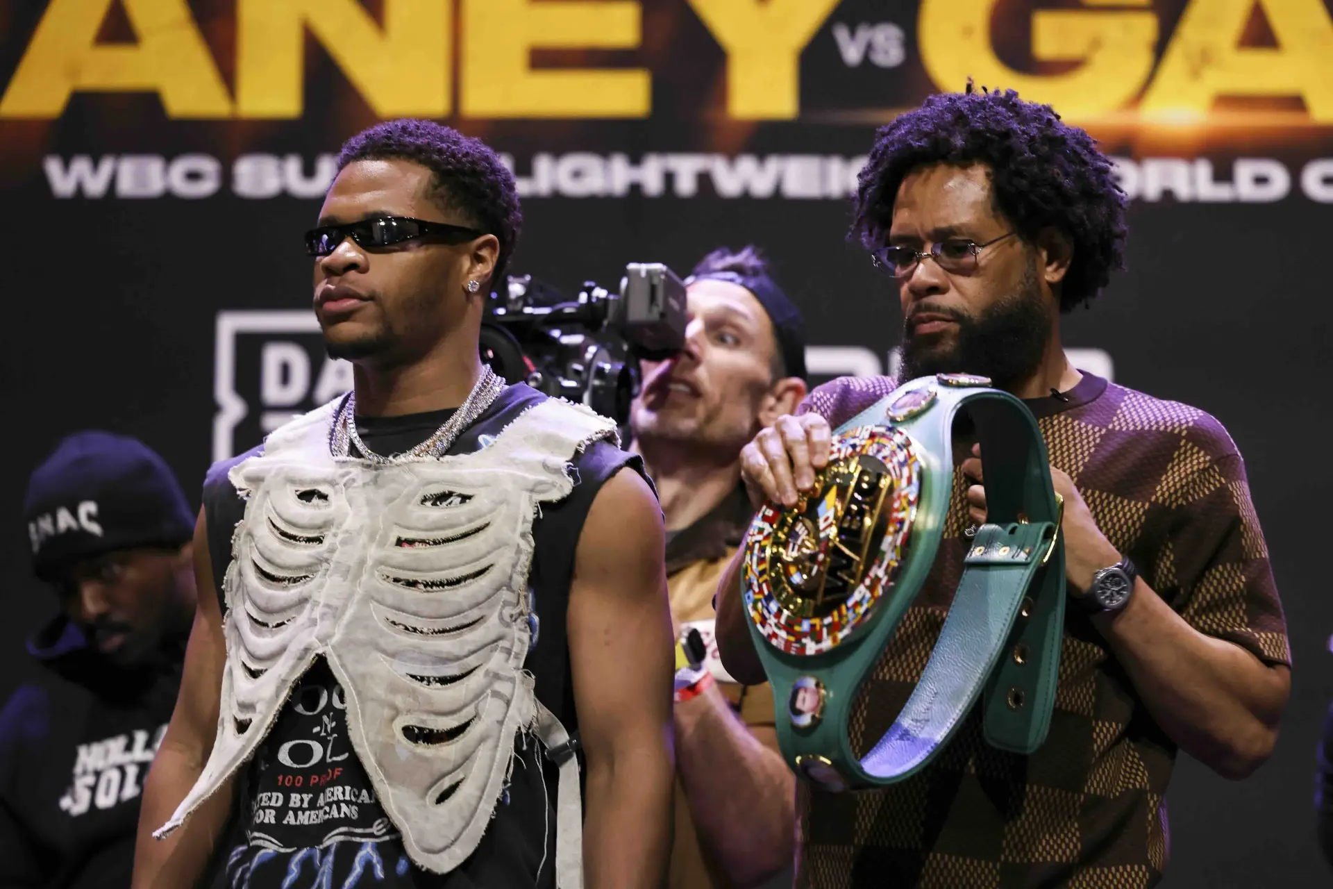 Devin Haney (left) stands with his father and trainer, Billy Haney, ahead of Devin's fight with Ryan Garcia in April 2024.