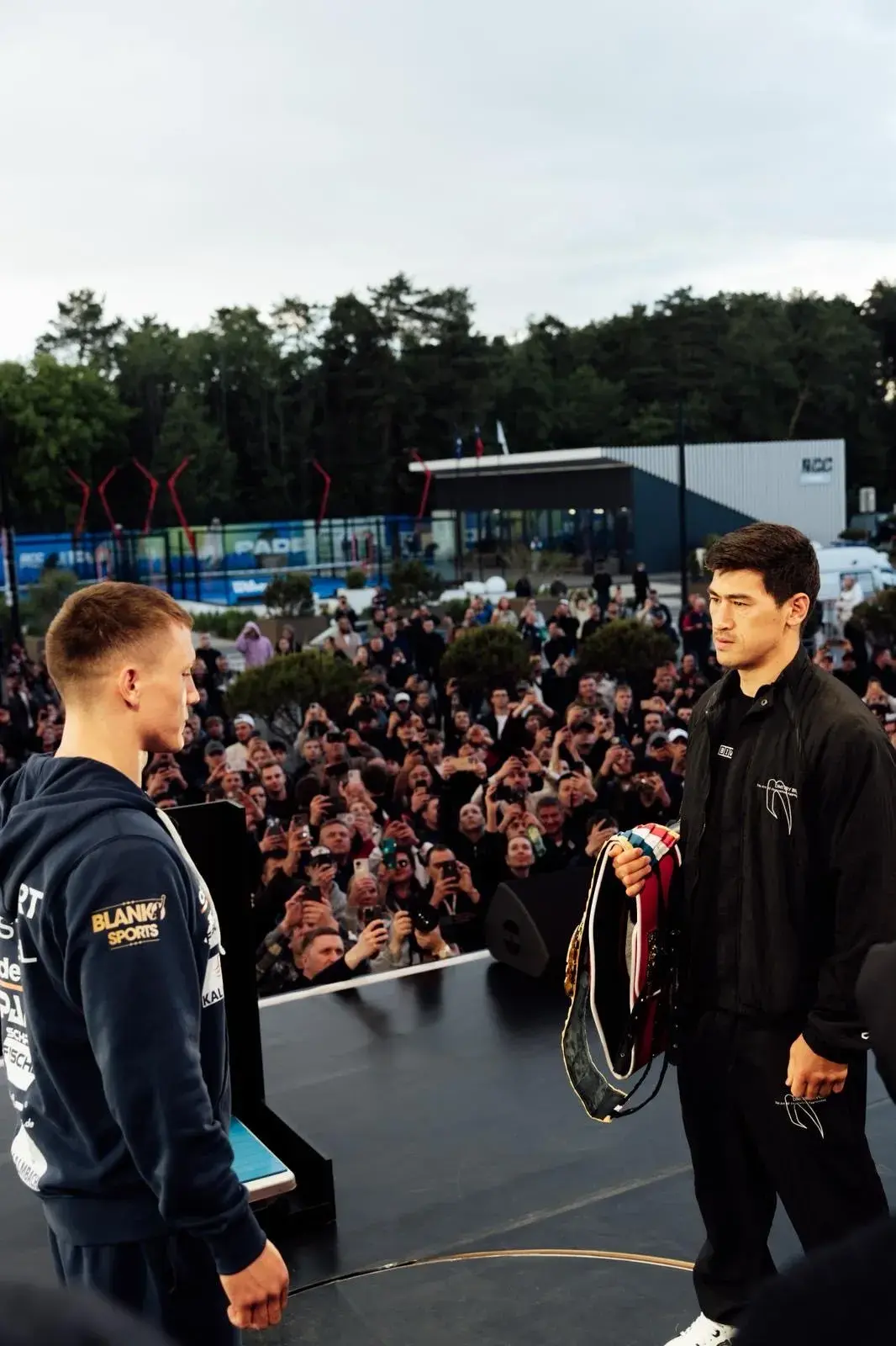 Dmitry Bivol [right] sizes up Michael Efiert on May 29, 2026