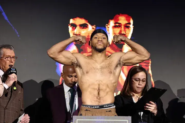 Brian Norman Jnr flexes his muscles after weighing in on November 21, 2025, for his boxing match with Devin Haney.