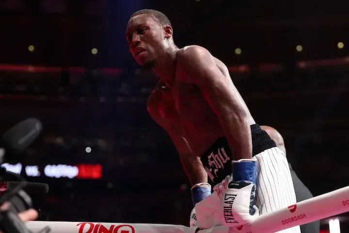 Bruce Carrington celebrates his victory over Carlos Castro to win the vacant WBC featherweight title on January 31, 2026.
