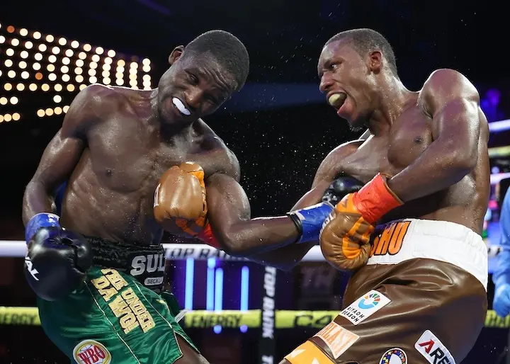 Bruce Arrington (right) and Sulaiman Segawa trade shots in their 2024 fight.