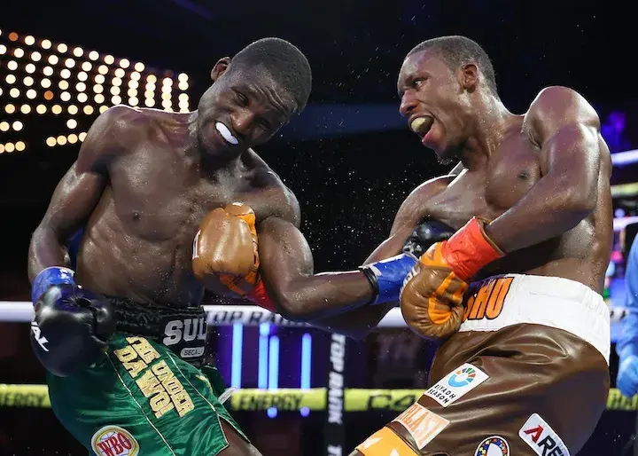 Bruce Arrington (right) and Sulaiman Segawa trade shots in their 2024 fight.