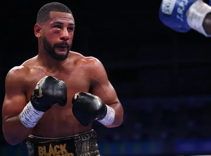 Caoimhin Agyarko looks through a swollen right eye en route to a split decision win over Ishmael Davis on September 13, 2025.