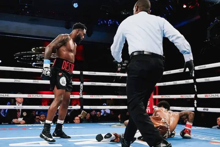 Carlos Adames (left) knocks down Austin "Ammo" Williams. (March 21, 2026)