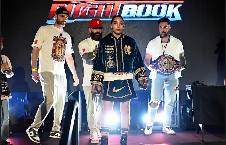 Chantel Navarro walks to the ring for a boxing match.