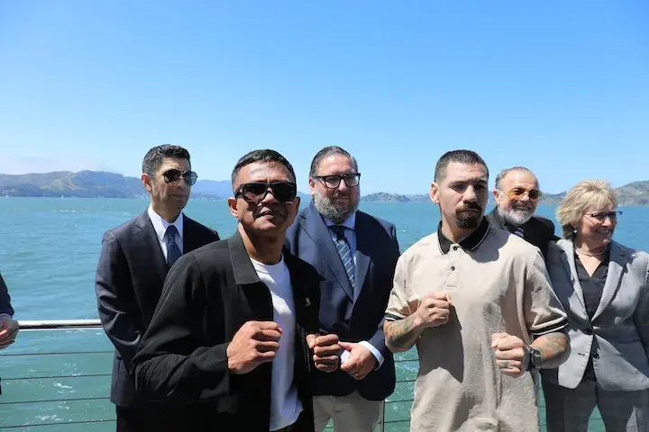 Charly Suarez (foreground on the left) and Manuel Avila pose for the media at a press conference in San Francisco. (May 7, 2026)