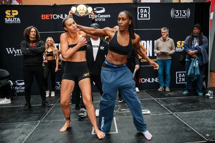 Che Kenneally (left) and Danielle Perkins (right) get into it at the weigh-in . (February 21, 2026)