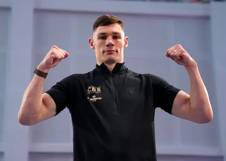 Former cruiserweight titleholder Chris Billam-Smith flexes for a photo.