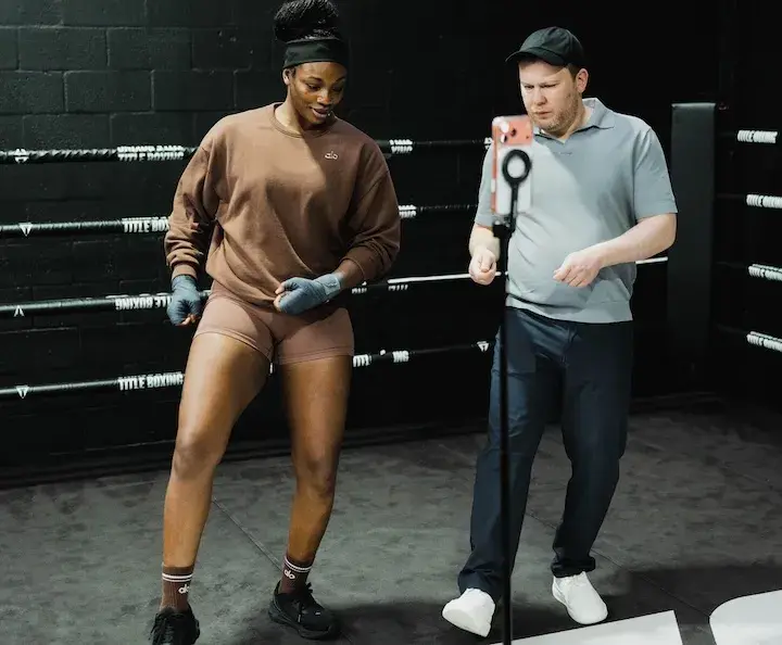 Claressa Shields (left) and promoter Dmitriy Salita (right) at the media workout ahead of her fight with Franchon Crews-Dezurn on Febraury 13, 2026.