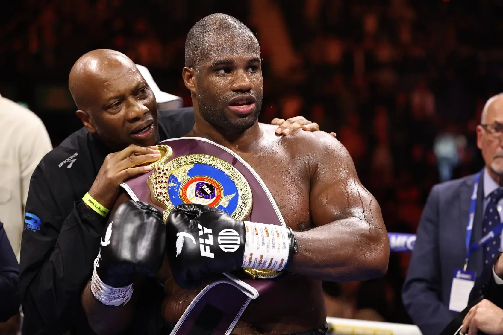 Daniel Dubois, with his father, clutches the IBF heavyweight title after beating Fabio Wardley in London on October 17, 2026