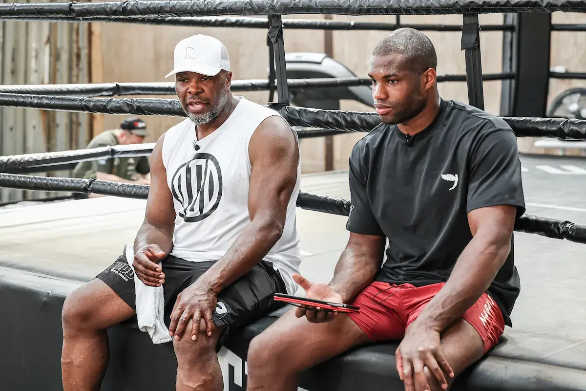 Daniel Dubois (right) sits with boxing trainer Don Charles.