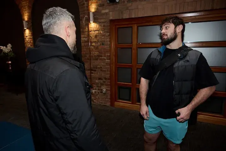 Dave Allen (right) talks with Carl Froch (left) at a media event on February 19, 2026.