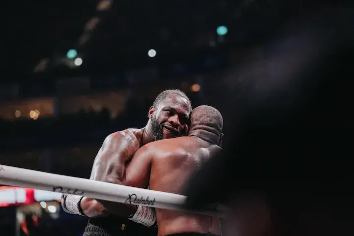 Deontay Wilder in a clinch with Derek Chisora Saturday at London's 02 Arena. (April 4, 2026)