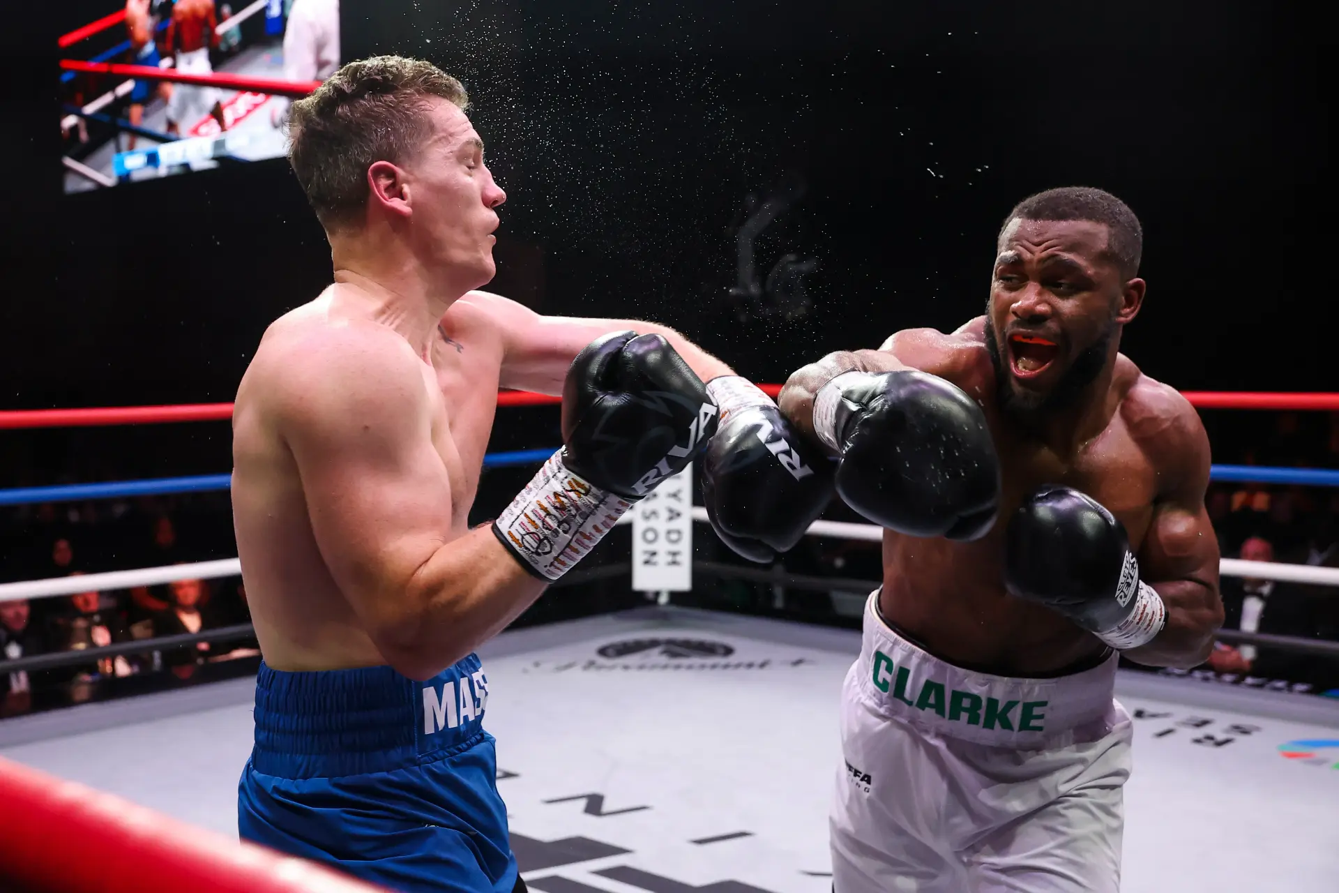 Cheavon Clarke catches Jack Massey with a clean right hand