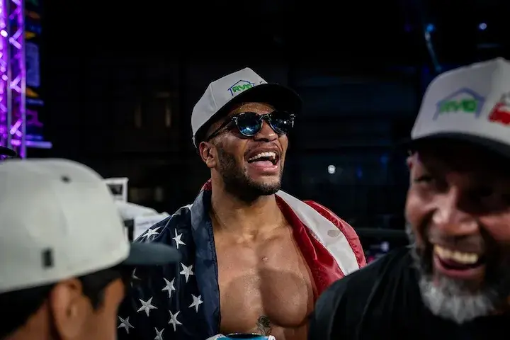 Ebenezer Griffith smiles in the ring after a fight.