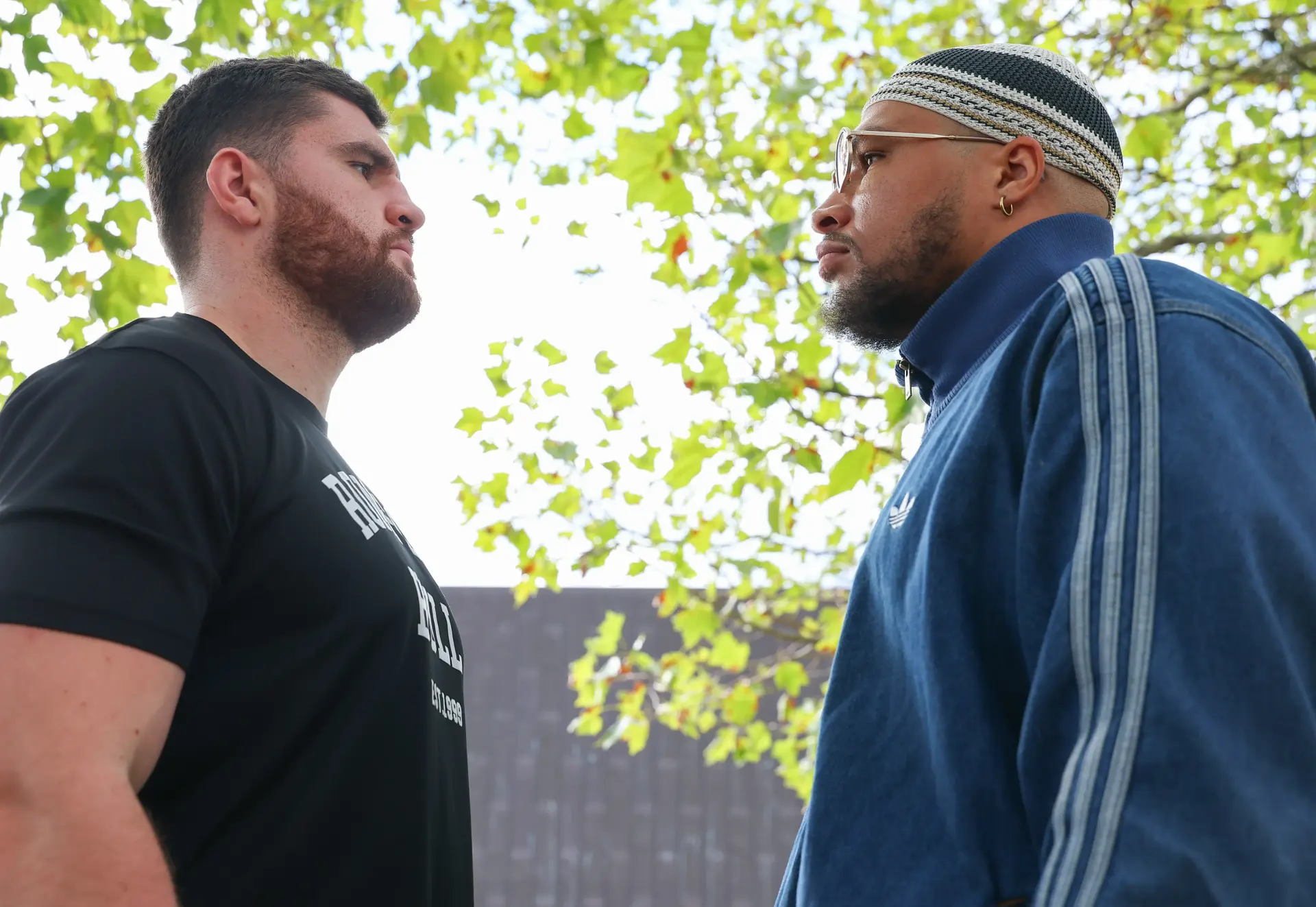 Johnny Fisher [left] and Michael Pirotton size each other up ahead of their September 26, 2026, showdown