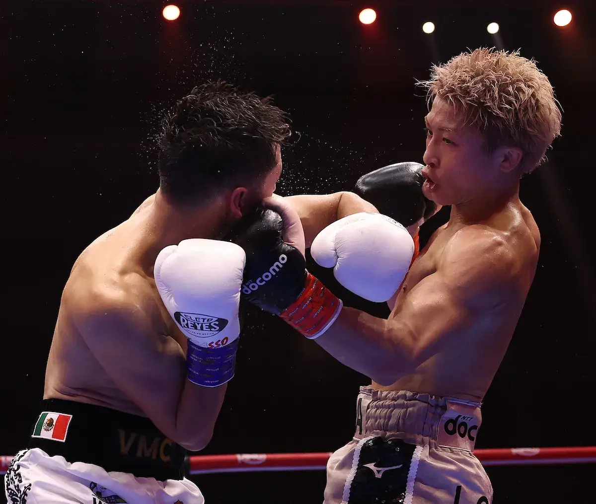 Naoya Inoue and Alan David Picasso swappunches during their boxing match on December 27, 2025.