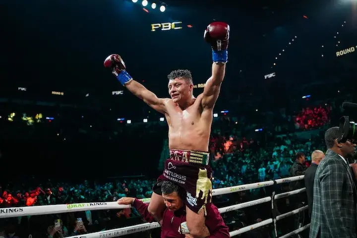 Isaac Cruz celebrates only for his bout with Lamont Roach to be called a draw